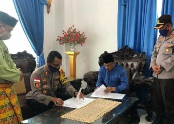 Bentuk Sinergitas Bupati dan Kapolres Natuna Tandatangani NPHD dukungan Operasional Penanganan Covid-19